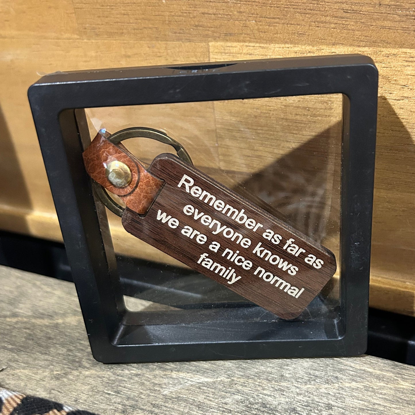 Remember… We are a Nice Normal Family Timber Key Tag