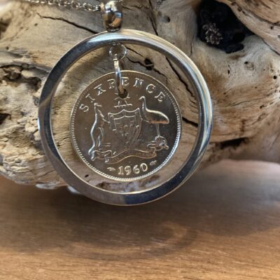 1960 Sixpence set with a stainless steel Frame